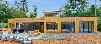 Idyllic lakeside house with outdoor sauna, patio and firepit