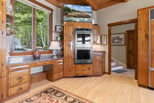 Elegant ocean view home with breathtaking views, private hot tub & large deck