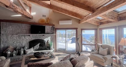 Elegant ocean view home with breathtaking views, private hot tub & large deck