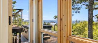 Elegant ocean view home with breathtaking views, private hot tub & large deck