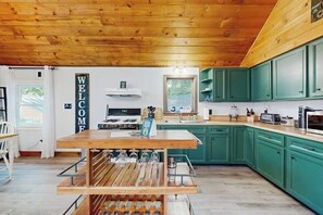 Fridge, microwave, oven, stovetop - Scenic retreat with a spacious deck, gas fireplace, and Moosehead Lake views (Greenville)