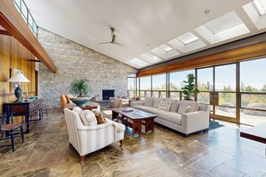 TV, books - Stylish Coastal Retreat w/ Spacious Layout & Access to the St. George Peninsula (St. George)