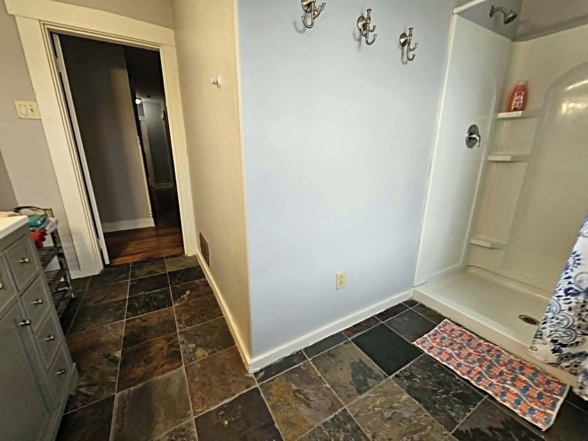 Shower, towels, soap, toilet paper