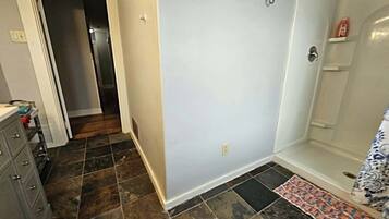 Shower, towels, soap, toilet paper