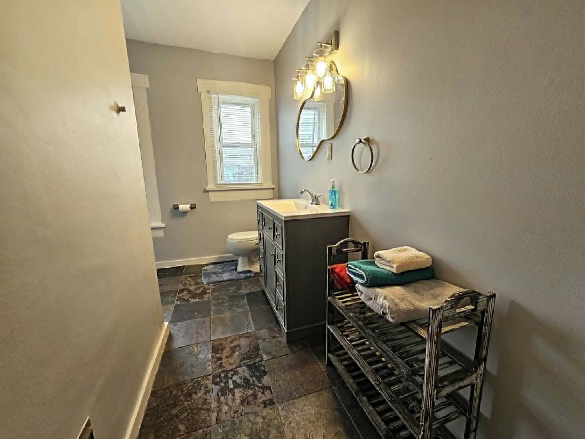 Shower, towels, soap, toilet paper