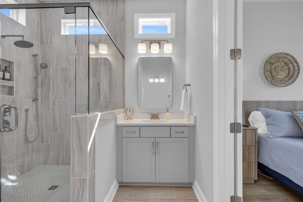 Shower, hair dryer, towels