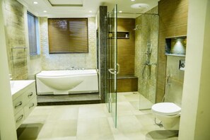Shower, hair dryer, towels, soap