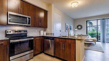 Fridge, microwave, stovetop, coffee/tea maker