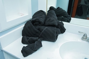 Hair dryer, towels, soap, toilet paper