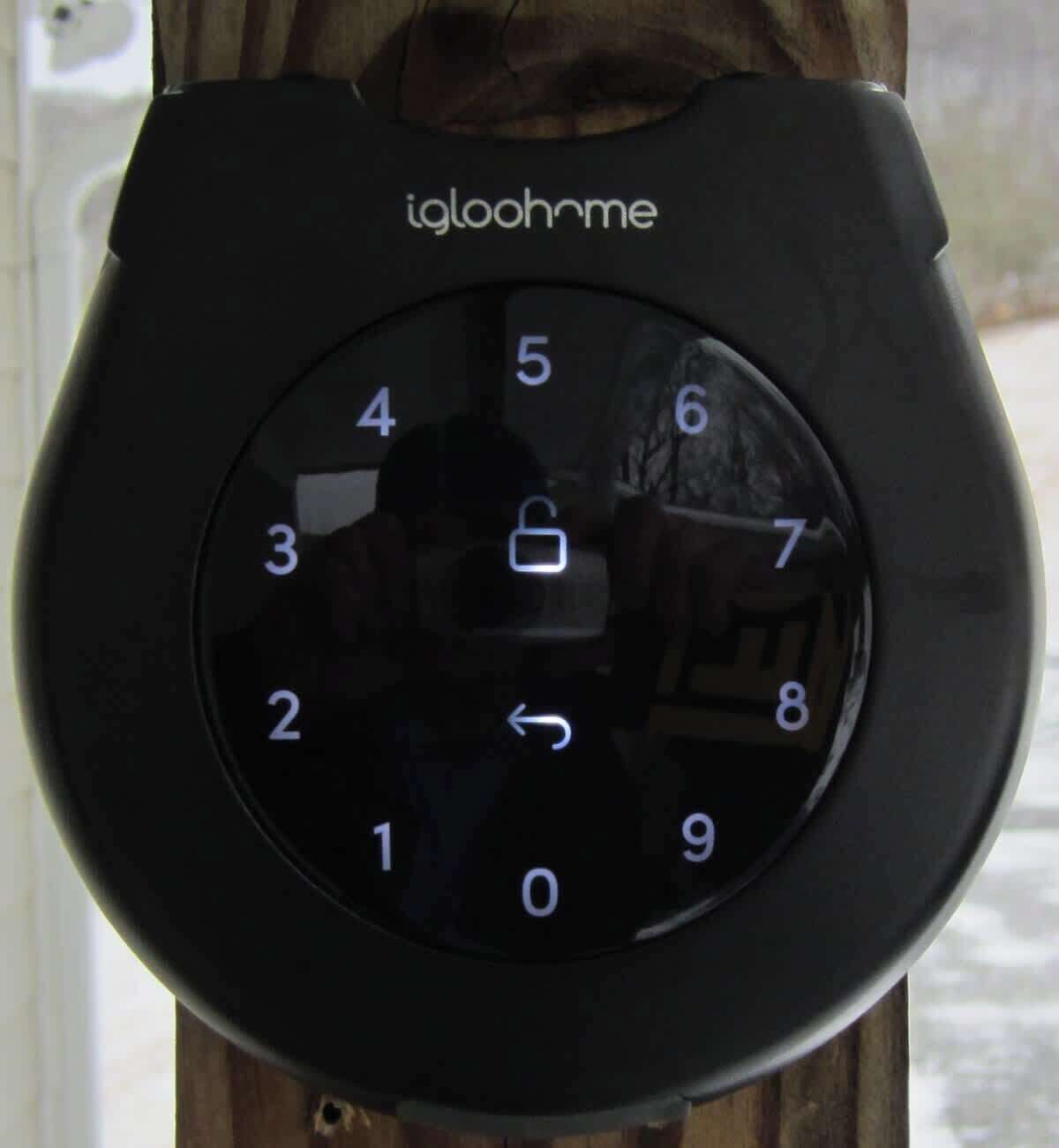 A black digital lock with numbers 0-9 and a padlock icon, labeled 'igloohome'.
