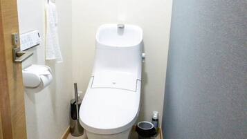 Hair dryer, bidet, towels, soap