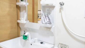 Hair dryer, bidet, towels, soap