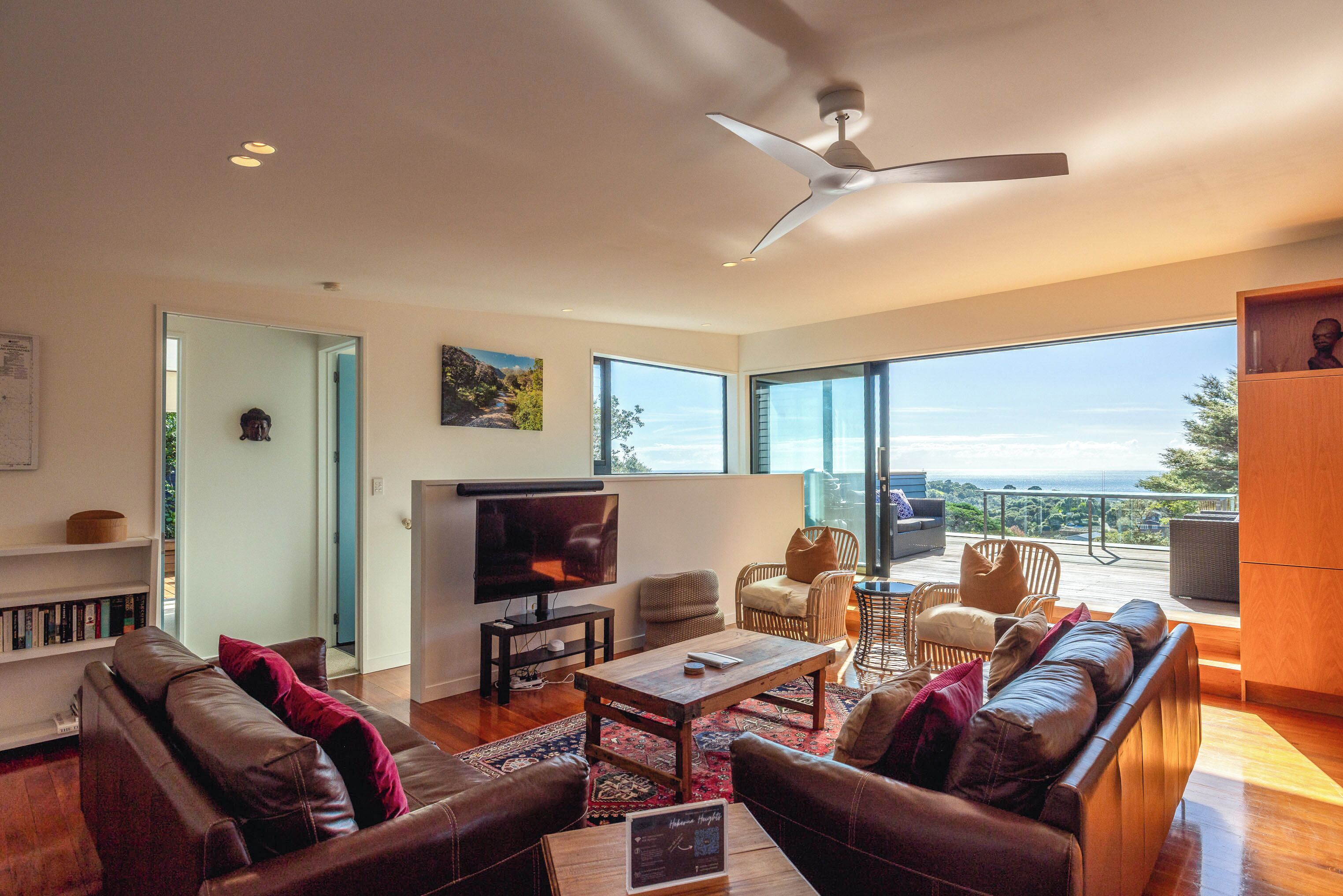 Deluxe House, Patio, Sea View | Living area | 55-inch LED TV with digital channels, smart speakers