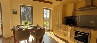Stylishly furnished first floor apartment with garden view