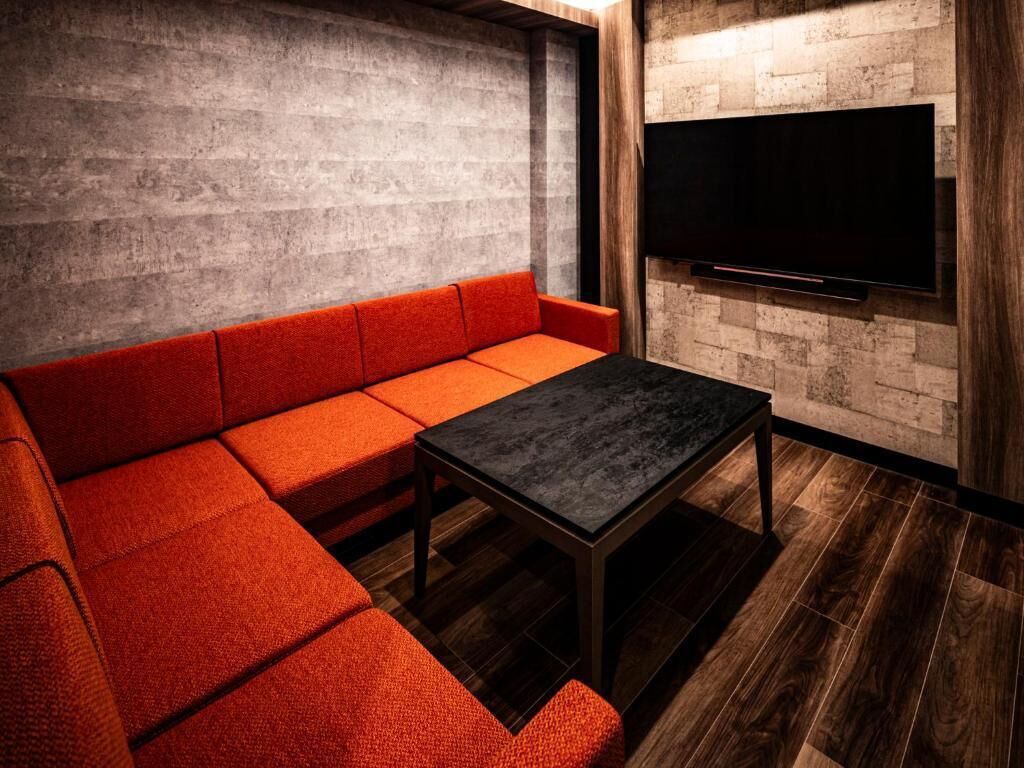 Suite, Non Smoking (TYPE C,With Hot Stone Spa) | Living area