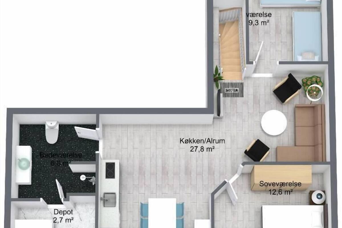 Grundriss eines Hotelzimmers mit Bett, einer kleinen Küchenzeile, einem Badezimmer und einem Wohnbereich.
