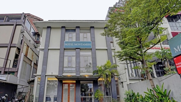 A hotel named 'HOTEL MONTAMER' with a modern facade, large windows, and a gated entrance. - Luxury Deluxe DBL Retreat W/ Free Wifi and Parking (Bandung)