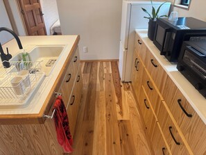 Fridge, microwave, stovetop, cookware/dishes/utensils