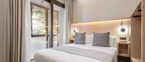 Ropa de cama de alta calidad, cubrecamas y artículos del minibar gratis