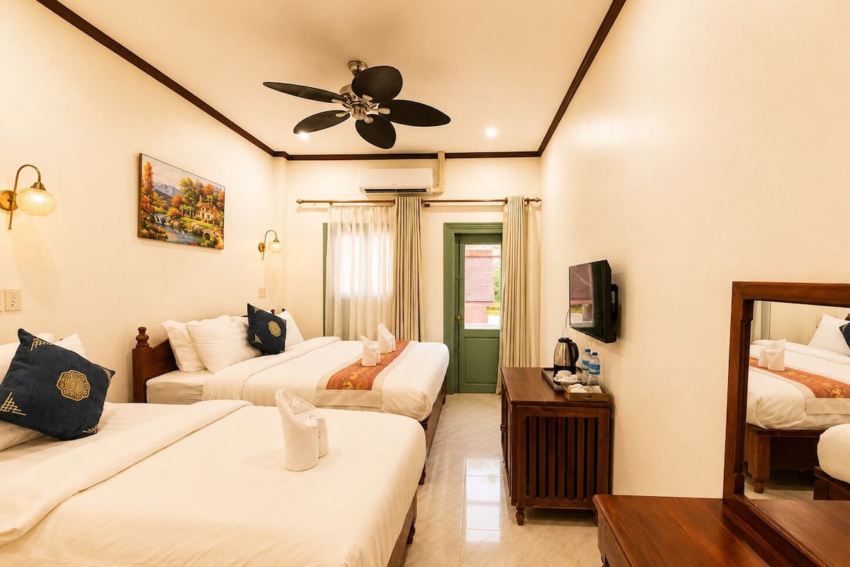 Family Triple Room, Non Smoking, Air conditioning | In-room safe, desk, laptop workspace, blackout curtains