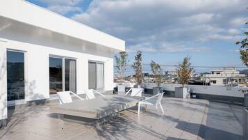 Luxury Quadruple Room, Balcony, City View | In-room safe, iron/ironing board, free WiFi