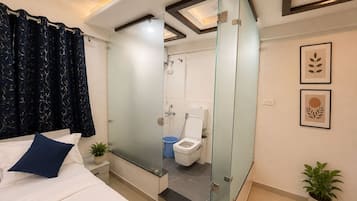 Shower, slippers, towels, soap