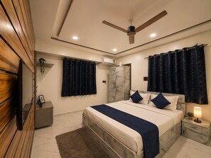 Family Studio Suite, Balcony, City View | In-room safe, desk, laptop workspace, soundproofing - Hotel lotus Guest House (Pune)