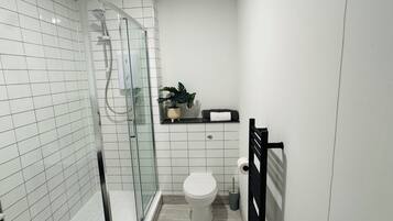 Shower, towels, soap, shampoo