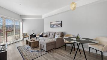 Deluxe Condo, 1 Bedroom, Pool Access, Mountain View | Living area | 55-inch TV with cable channels
