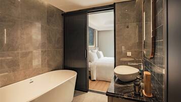 Junior Double Room, Non Smoking, Balcony | Bathroom | Separate tub and shower, slippers, soap, shampoo
