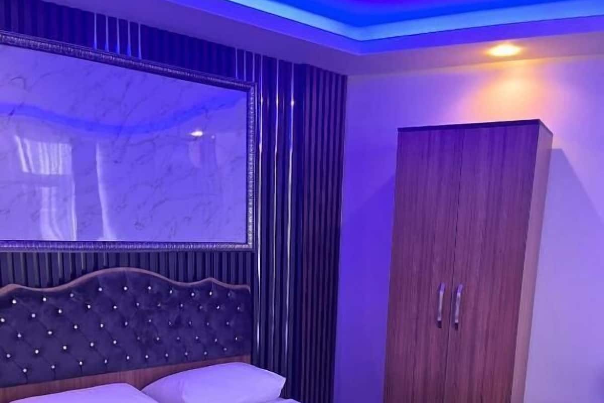 Family Room, Balcony, City View | Desk, soundproofing, iron/ironing board, free WiFi