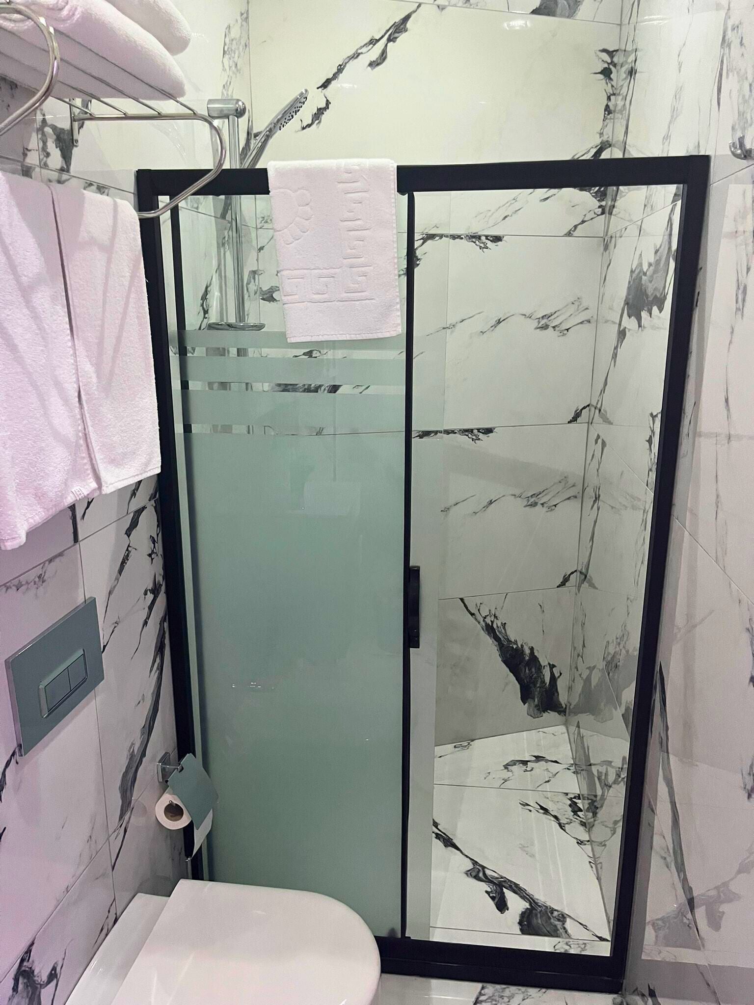 Standard Double Room | Bathroom | Shower, hair dryer, slippers, towels