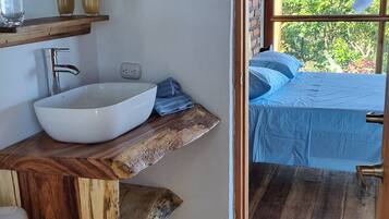 Shower, towels, soap, toilet paper