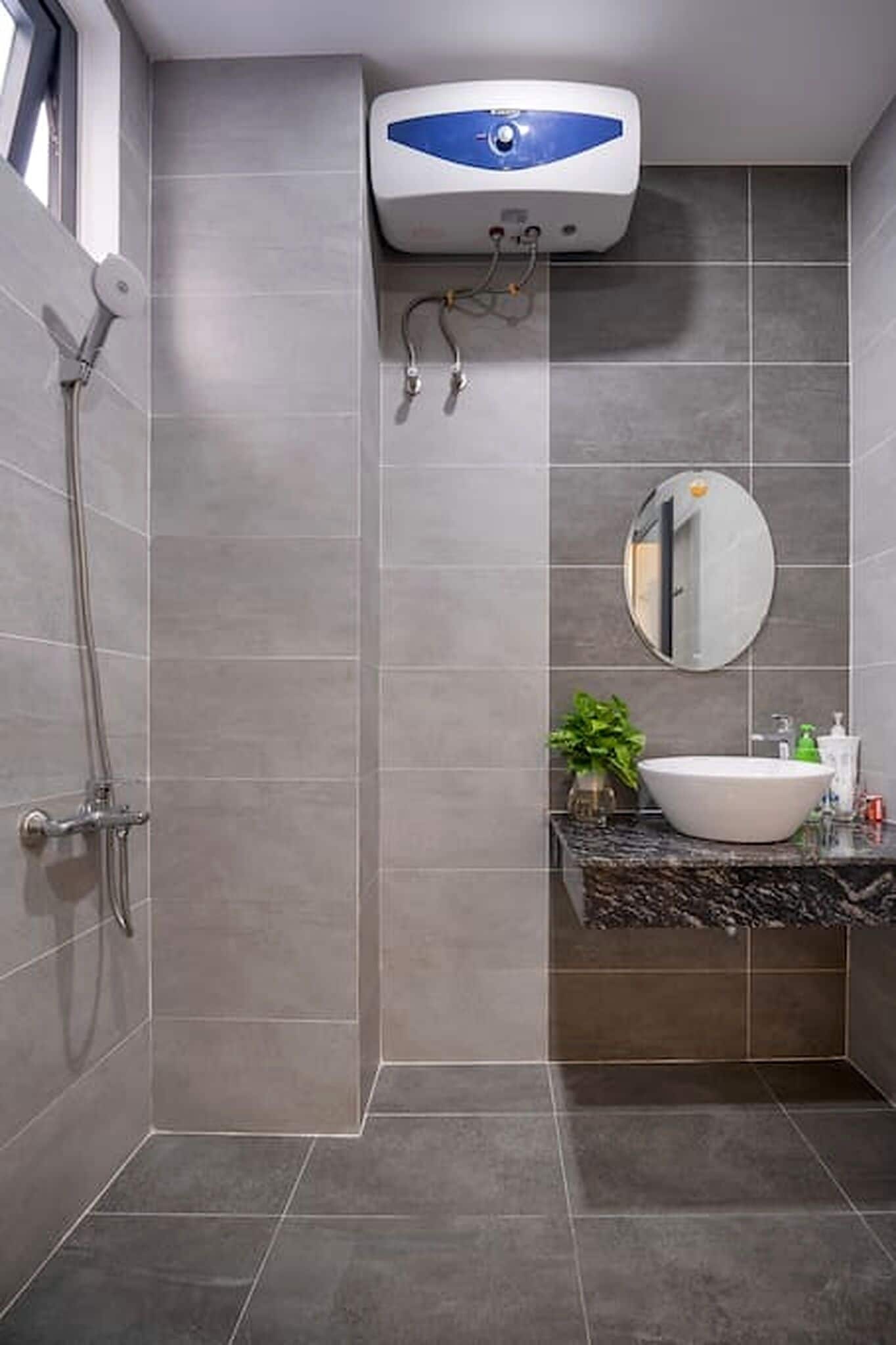 Shower, hair dryer, slippers, towels