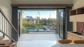 Estudio Confort, vista al jardín | Interior