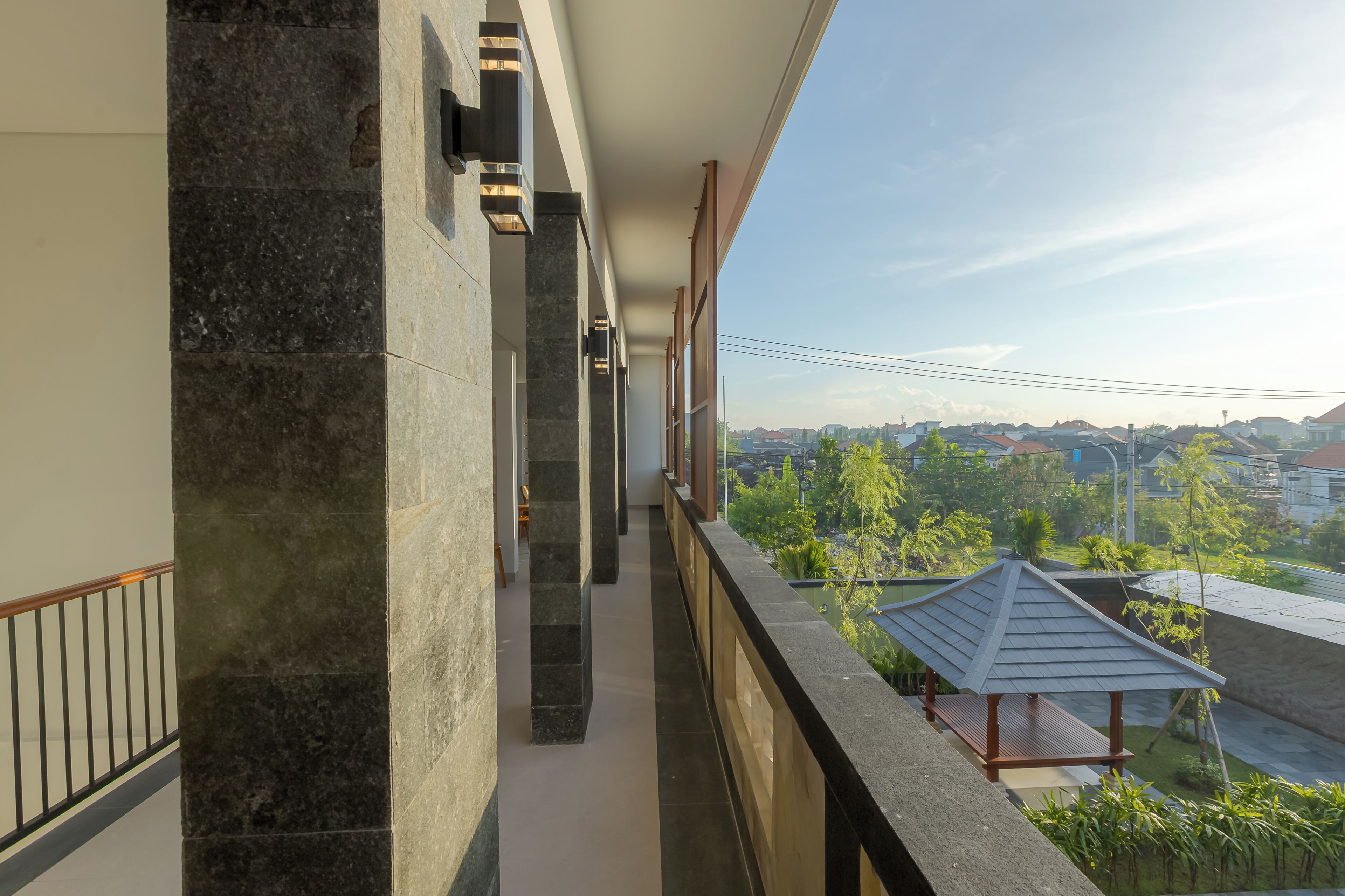 Estudio Confort, vista al jardín | Terraza o patio