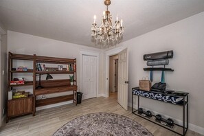 Interior - A true hidden oasis with park-like grounds—your own private pickleball retreat. Enjoy a beautifully maintained setting with pickleball, tennis, and basketball surrounded by mature trees. (Bixby)