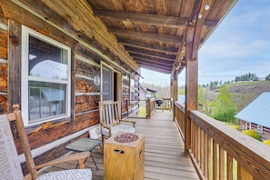 A wooden cabin with a porch, a grill, and a view of the surrounding landscape. - 2 Mi to Blue Ridge Pkwy! Mtn Escape w/ Fireplace (Meadows Of Dan)