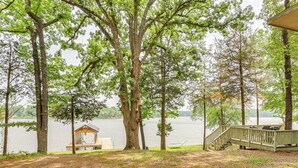 A lakeside cabin with a deck, a gazebo, and a hammock. - Lakefront Winnsboro Home w/ 20+ Acres! (Winnsboro)