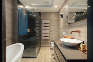 Shower, jetted tub, hair dryer, bidet