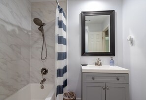 Hair dryer, towels, soap, shampoo