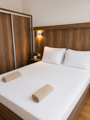 Family Apartment, Balcony, Garden View | Blackout curtains, iron/ironing board, free WiFi