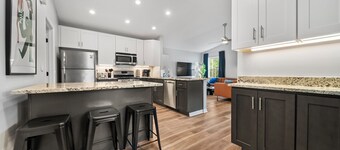 Modern 3 bed,2 full bath Escape w/ Game Room and Huge Fenced Yard