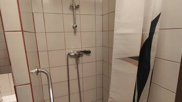 Shower, towels, soap, toilet paper