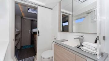 Hair dryer, towels, soap, toilet paper