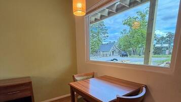 Desk, laptop workspace, free WiFi, bed sheets