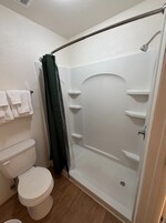 Shower, free toiletries, towels, soap