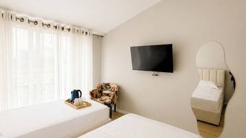Superior Twin Room, Balcony, Garden View | Minibar, in-room safe, desk, blackout drapes