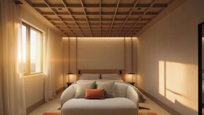 A bedroom with a large bed, bedside lamps, a window with curtains, and a wooden ceiling.