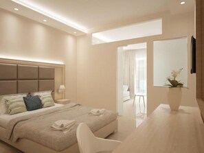 Una habitación de hotel moderna con cama, mesita de noche, lámpara y vistas a la habitación contigua.